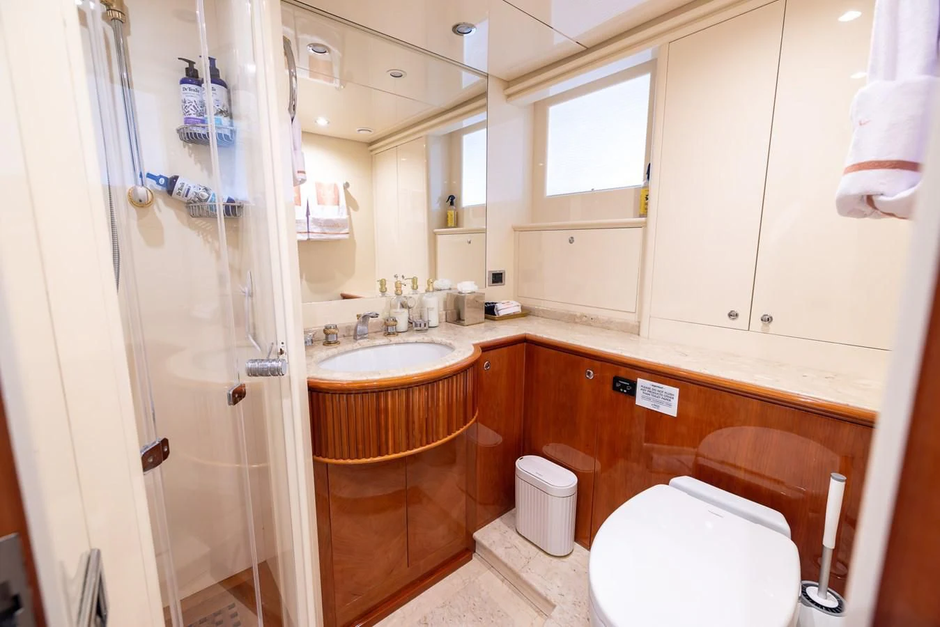 a bathroom with a shower and sink aboard ENDLESS SUN Yacht for Sale