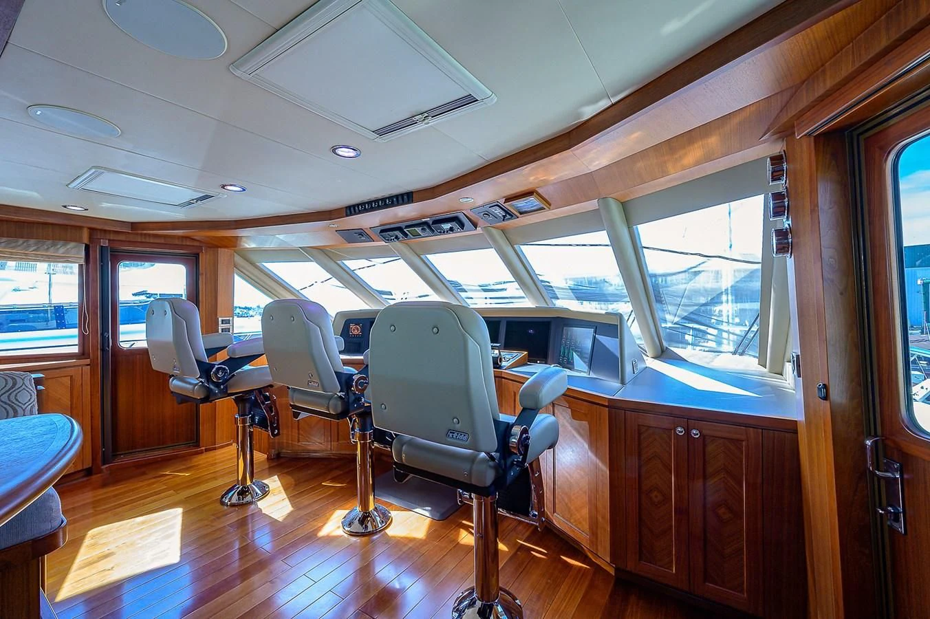 a room with chairs and a table aboard ONE SHOT Yacht for Sale