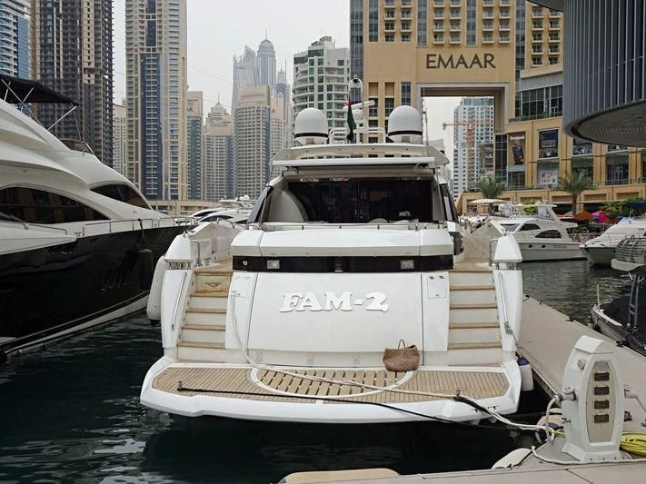 a boat in a harbor aboard UD30 Yacht for Sale