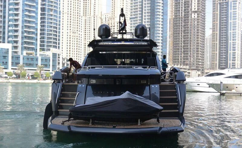 a boat with a statue on it aboard UD30 Yacht for Sale