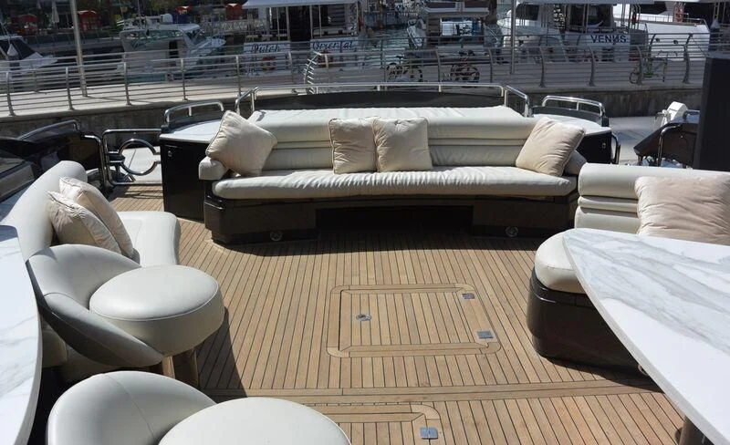 a couch and chairs in a room aboard UD30 Yacht for Sale