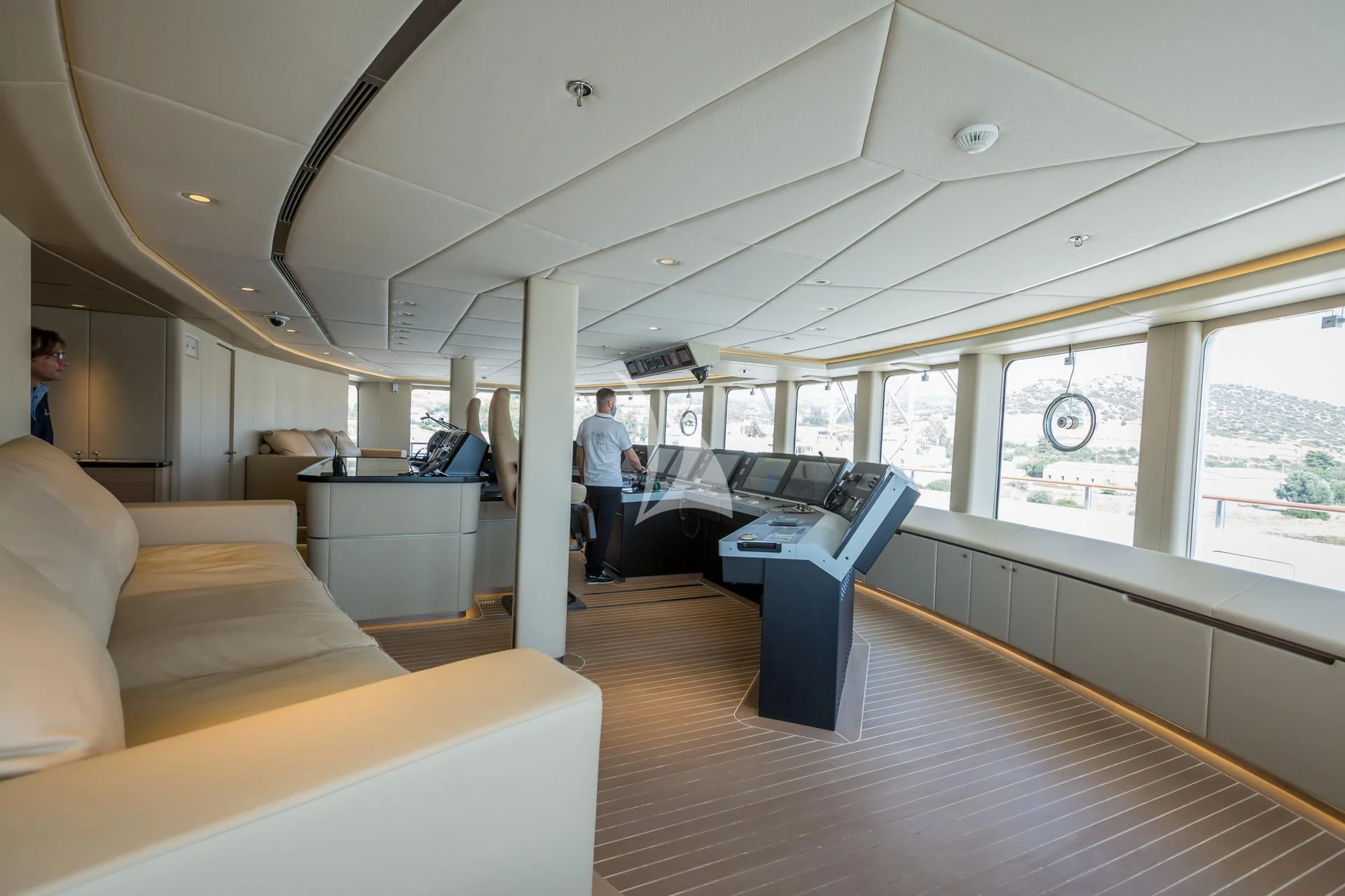 a person standing in a room aboard DREAM Yacht for Sale