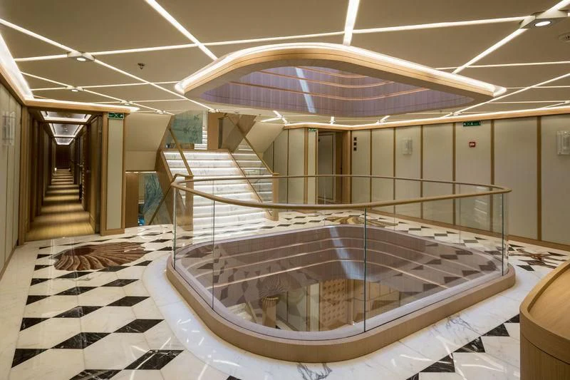 a large indoor swimming pool aboard DREAM Yacht for Sale