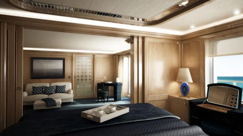 a bedroom with a bed and a television aboard DREAM Yacht for Sale