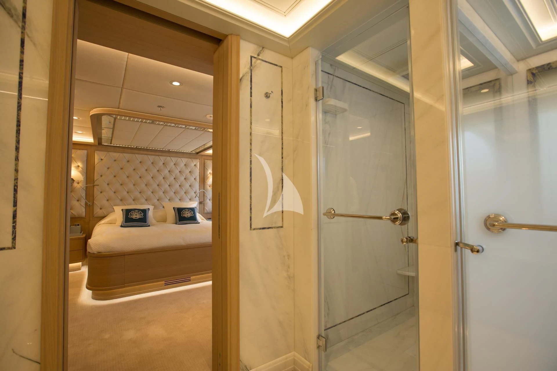 a room with a bed and a door aboard DREAM Yacht for Sale