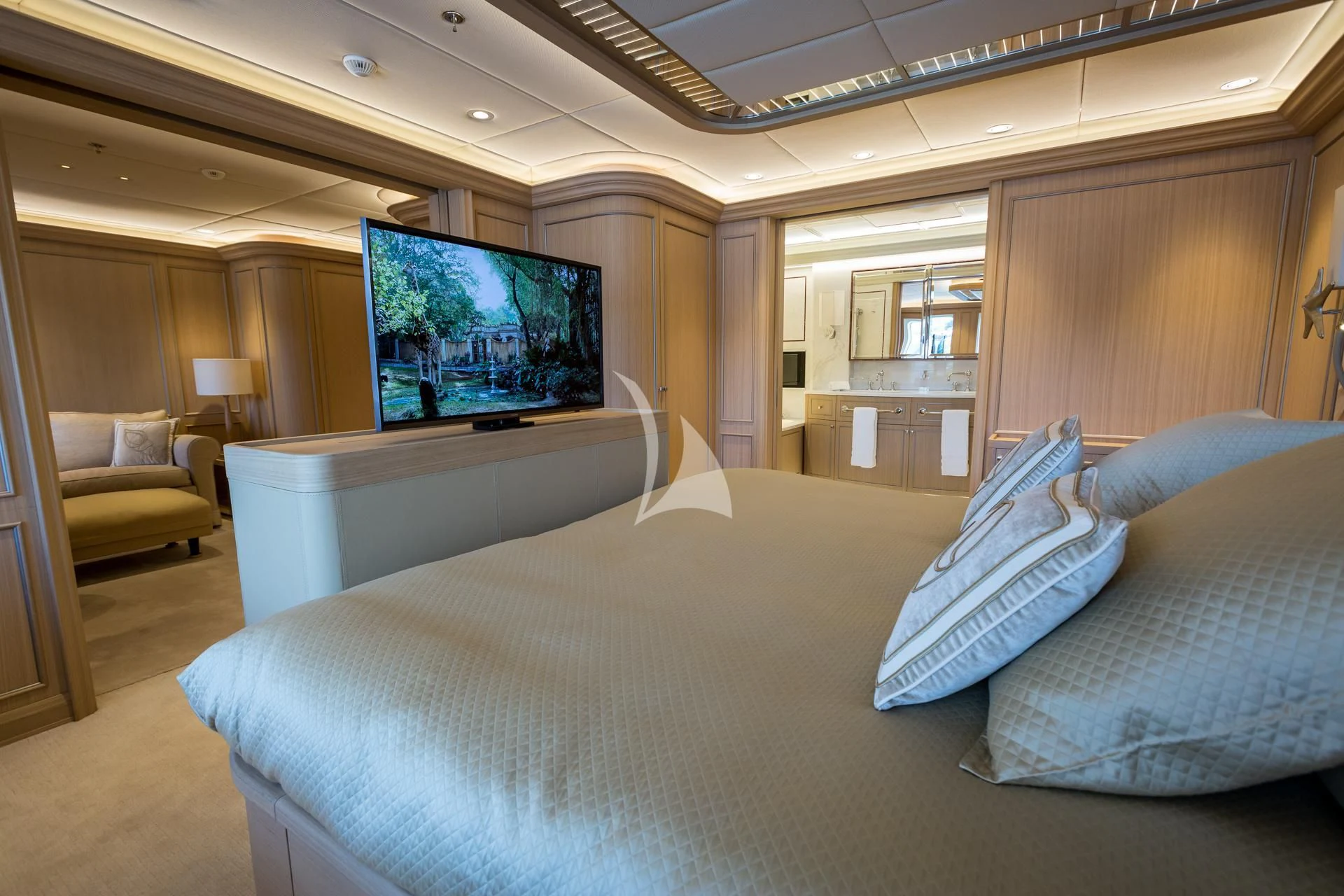 a large bed in a hotel room aboard DREAM Yacht for Sale