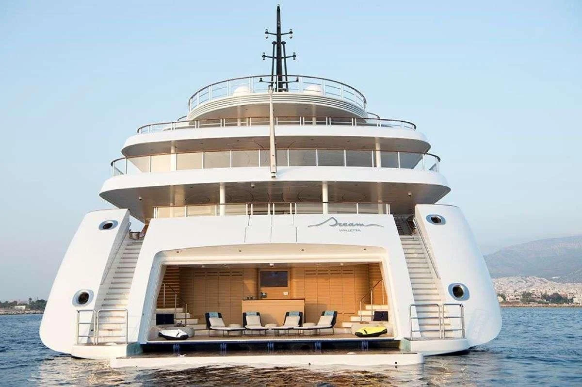 a large white ship on the water aboard DREAM Yacht for Sale