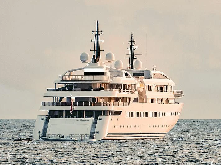 a large white boat in the water aboard DREAM Yacht for Sale