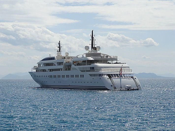 a large white ship in the water aboard DREAM Yacht for Sale