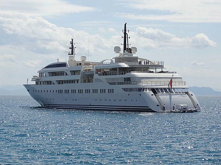 a large white ship in the water aboard DREAM Yacht for Sale