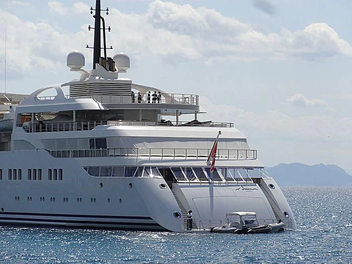 a large white ship in the water aboard DREAM Yacht for Sale