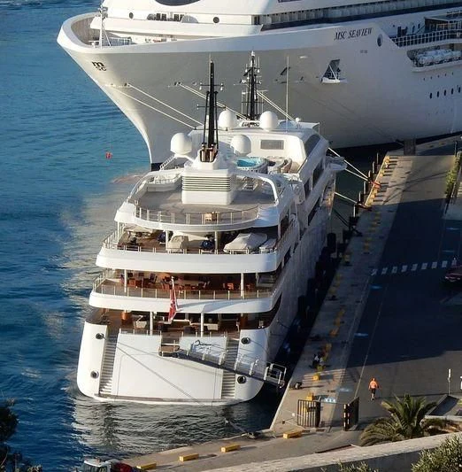 a large white boat aboard DREAM Yacht for Sale