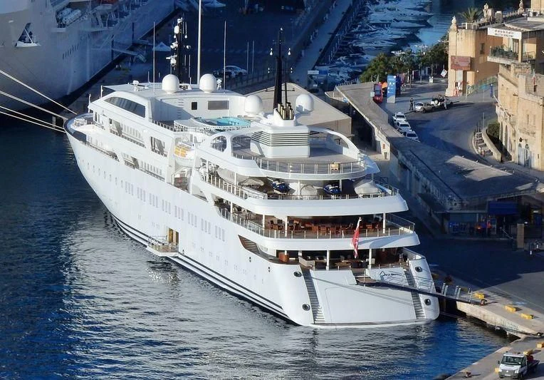 a large white boat aboard DREAM Yacht for Sale