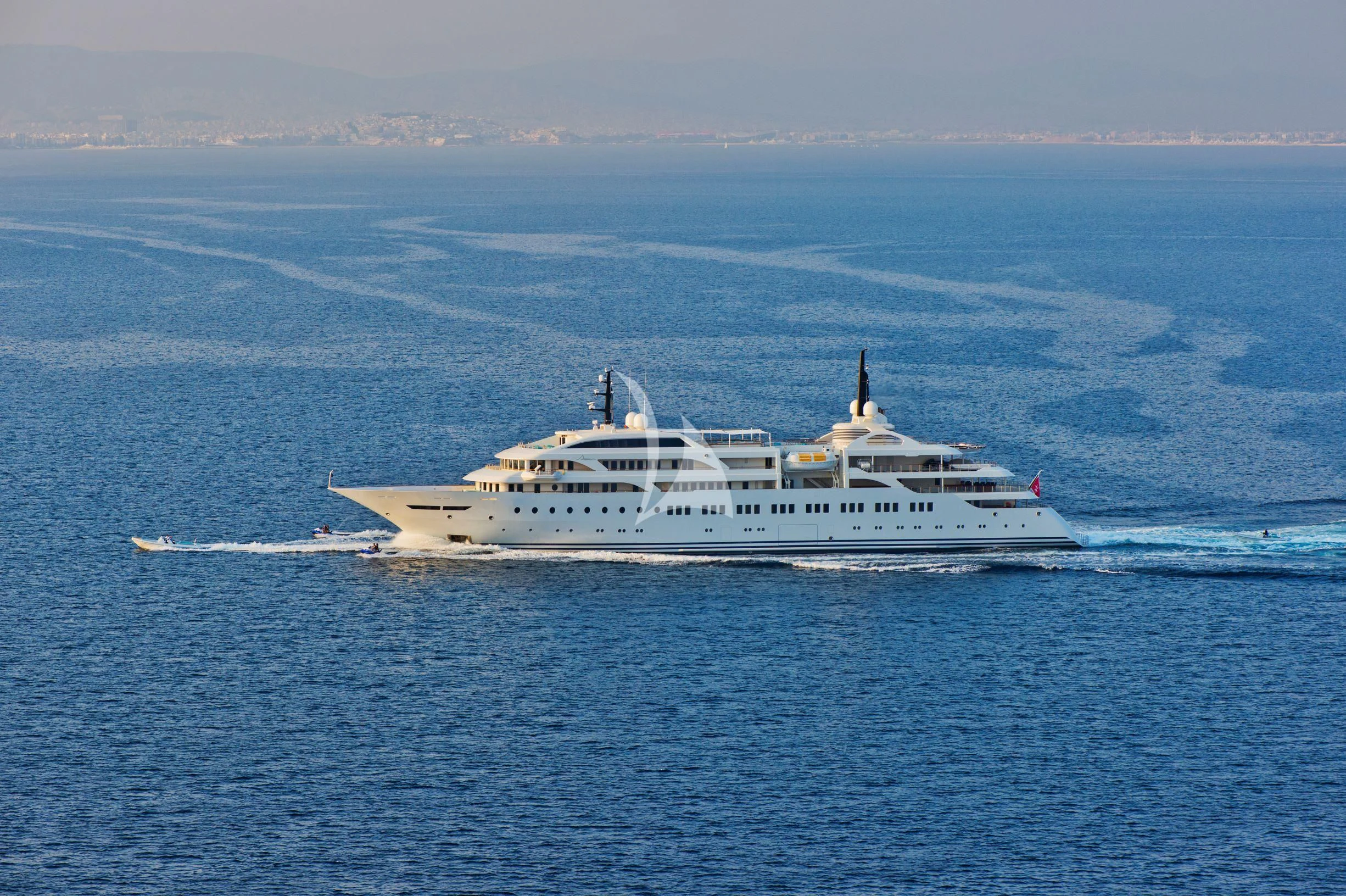 a white boat in the water aboard DREAM Yacht for Sale
