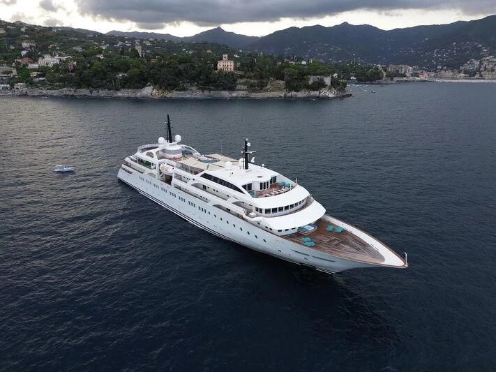 a white boat in the water aboard DREAM Yacht for Sale