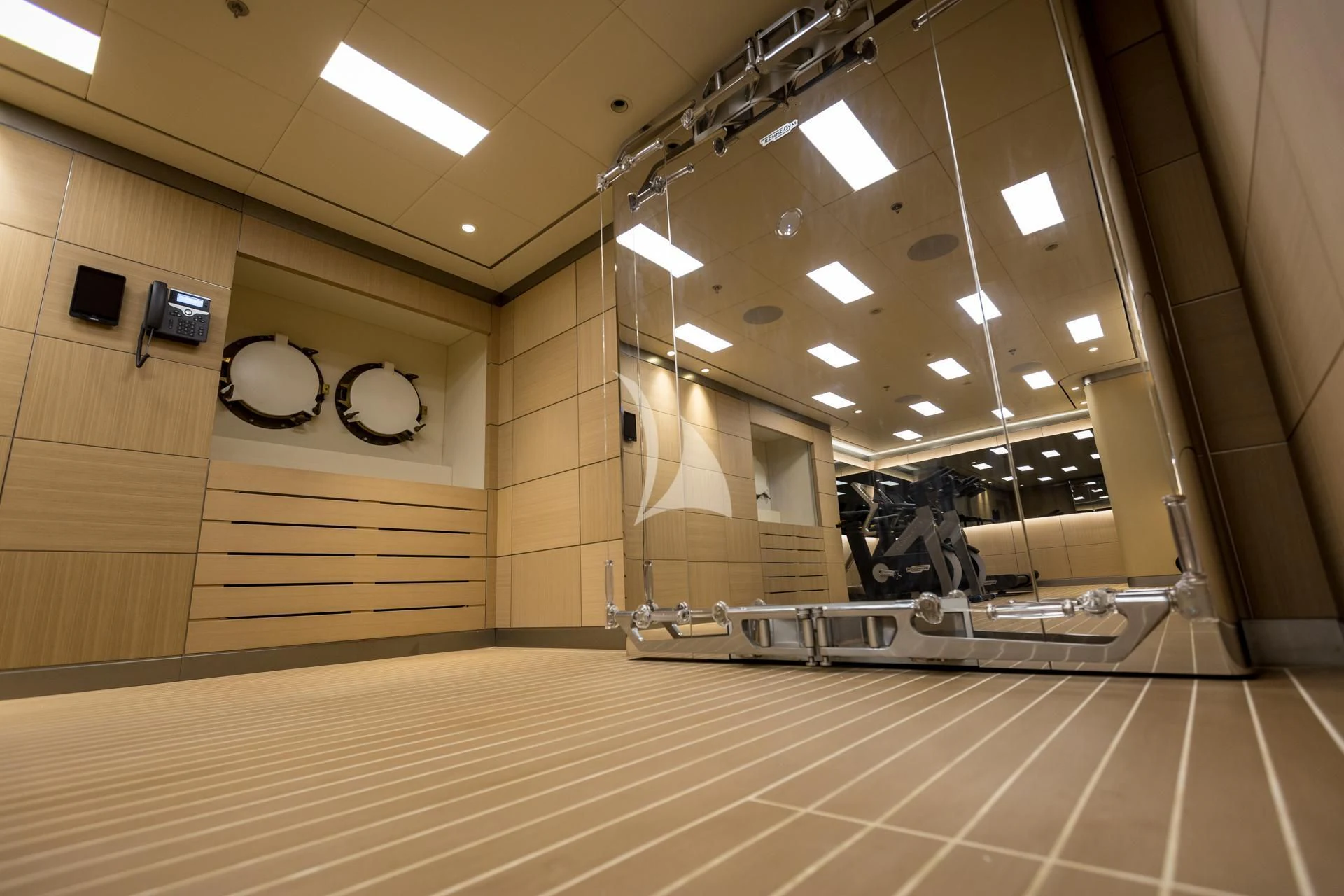 a large room with mirrors and a counter with sinks aboard DREAM Yacht for Sale