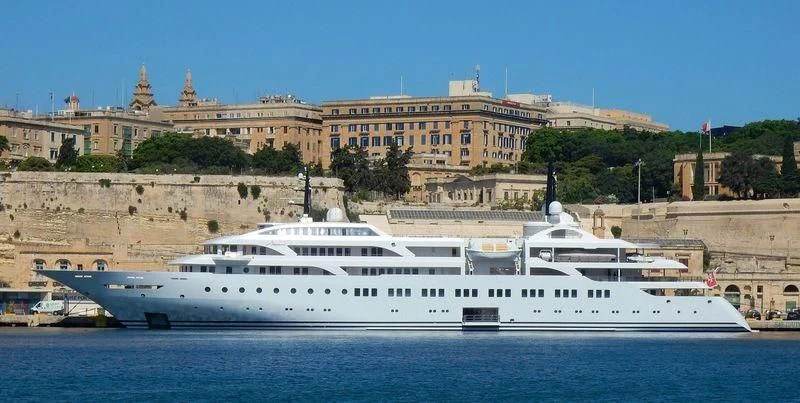 a large white boat in the water aboard DREAM Yacht for Sale
