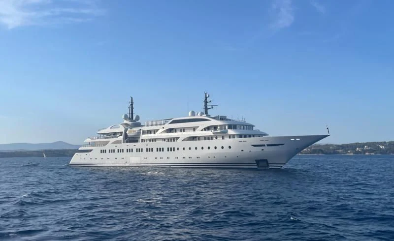 a large white ship in the water aboard DREAM Yacht for Sale
