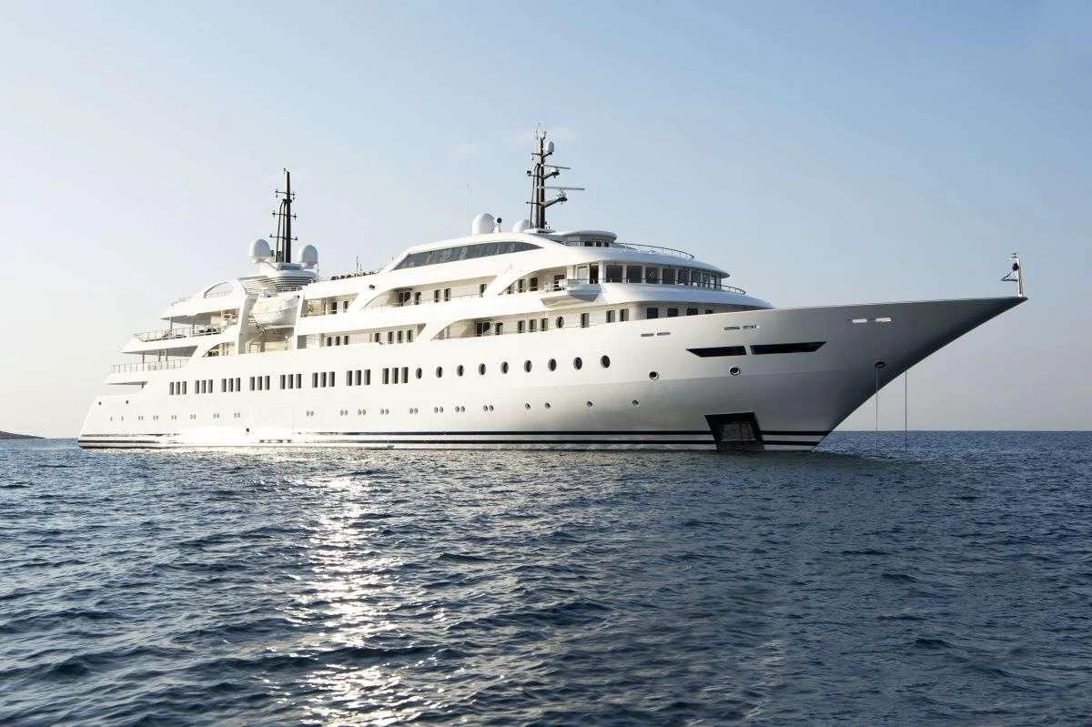 a large white ship in the water aboard DREAM Yacht for Sale
