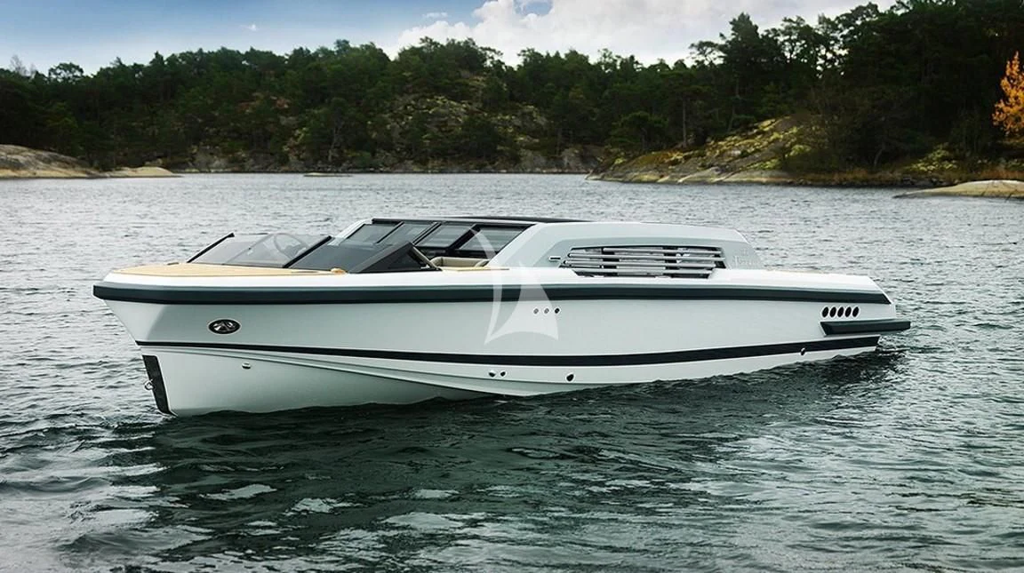 a white boat on water aboard DREAM Yacht for Sale