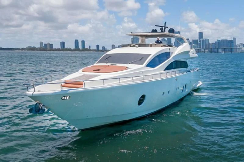 a white yacht in the water aboard JACRU Yacht for Sale