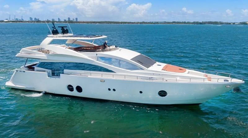 a white yacht in the water aboard JACRU Yacht for Sale
