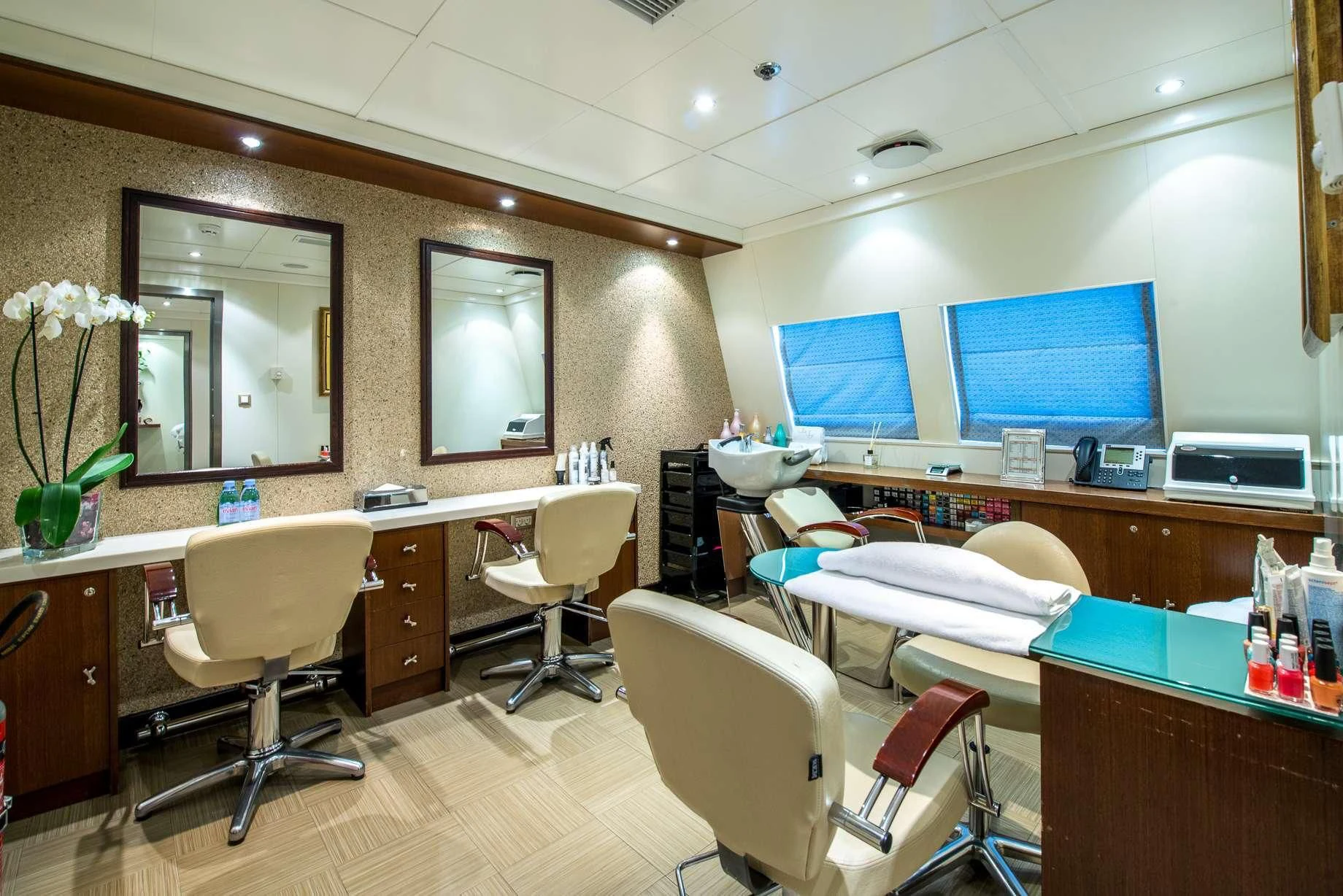 a room with desks and chairs aboard LAUREN L Yacht for Sale