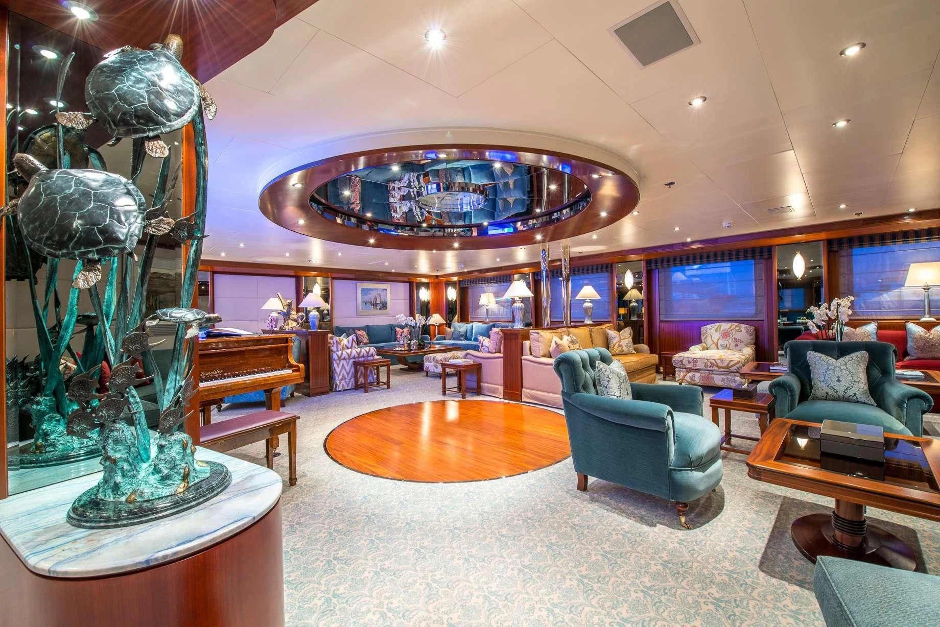 a large room with a large chandelier and a large chandelier aboard LAUREN L Yacht for Sale