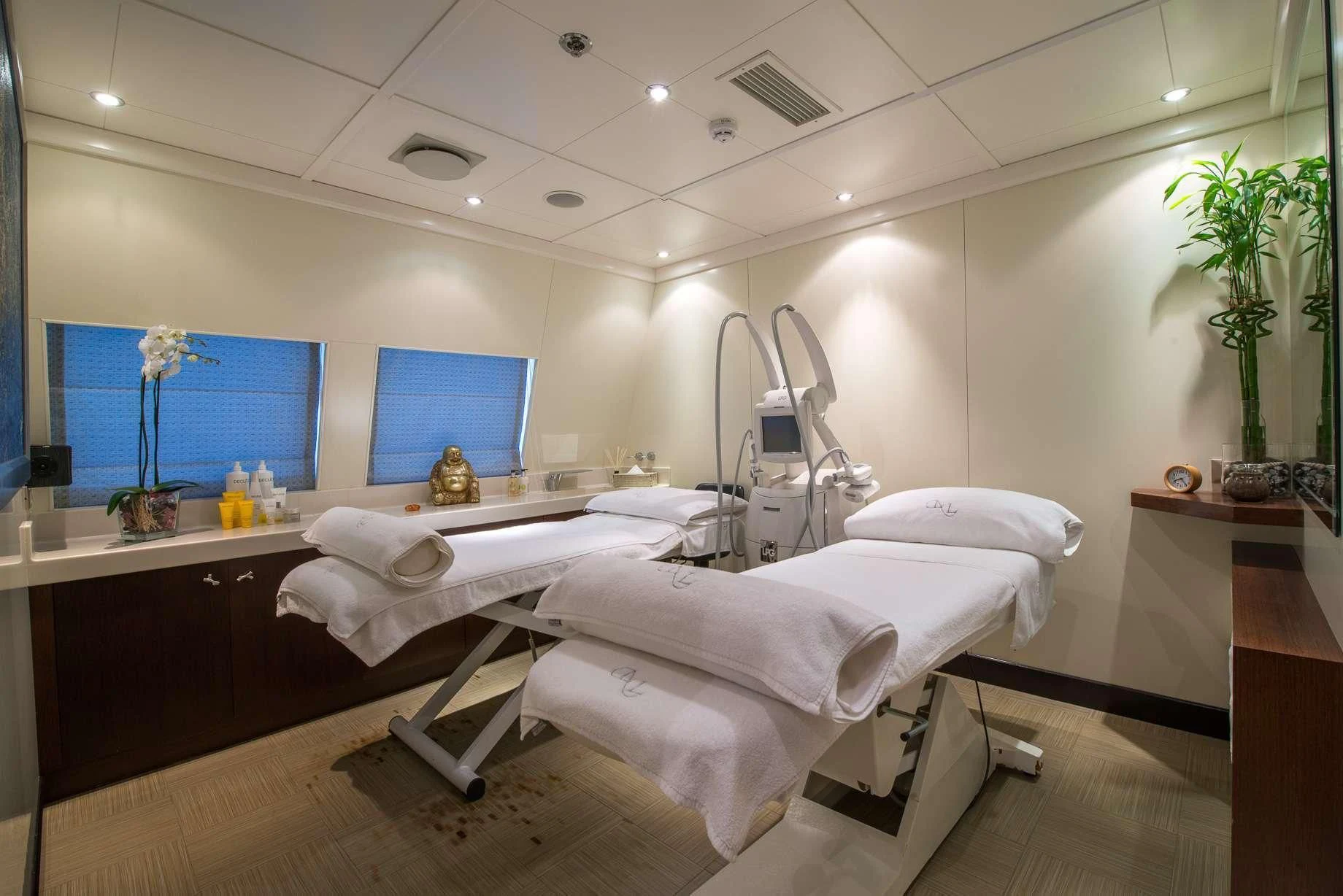 a room with two beds aboard LAUREN L Yacht for Sale