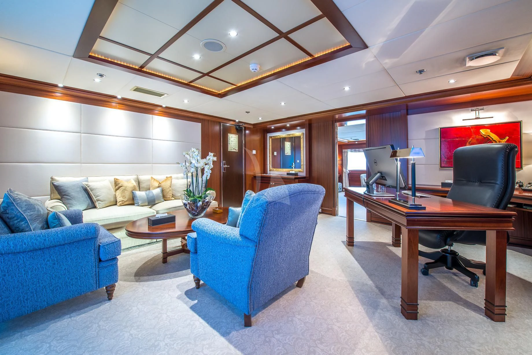 a living room with a couch and a table aboard LAUREN L Yacht for Sale