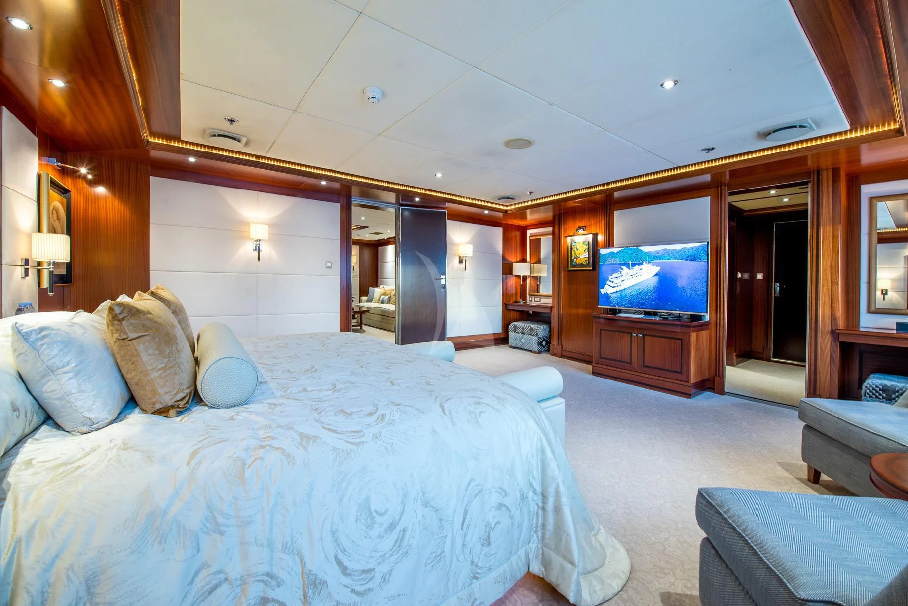 a bedroom with a large bed aboard LAUREN L Yacht for Sale