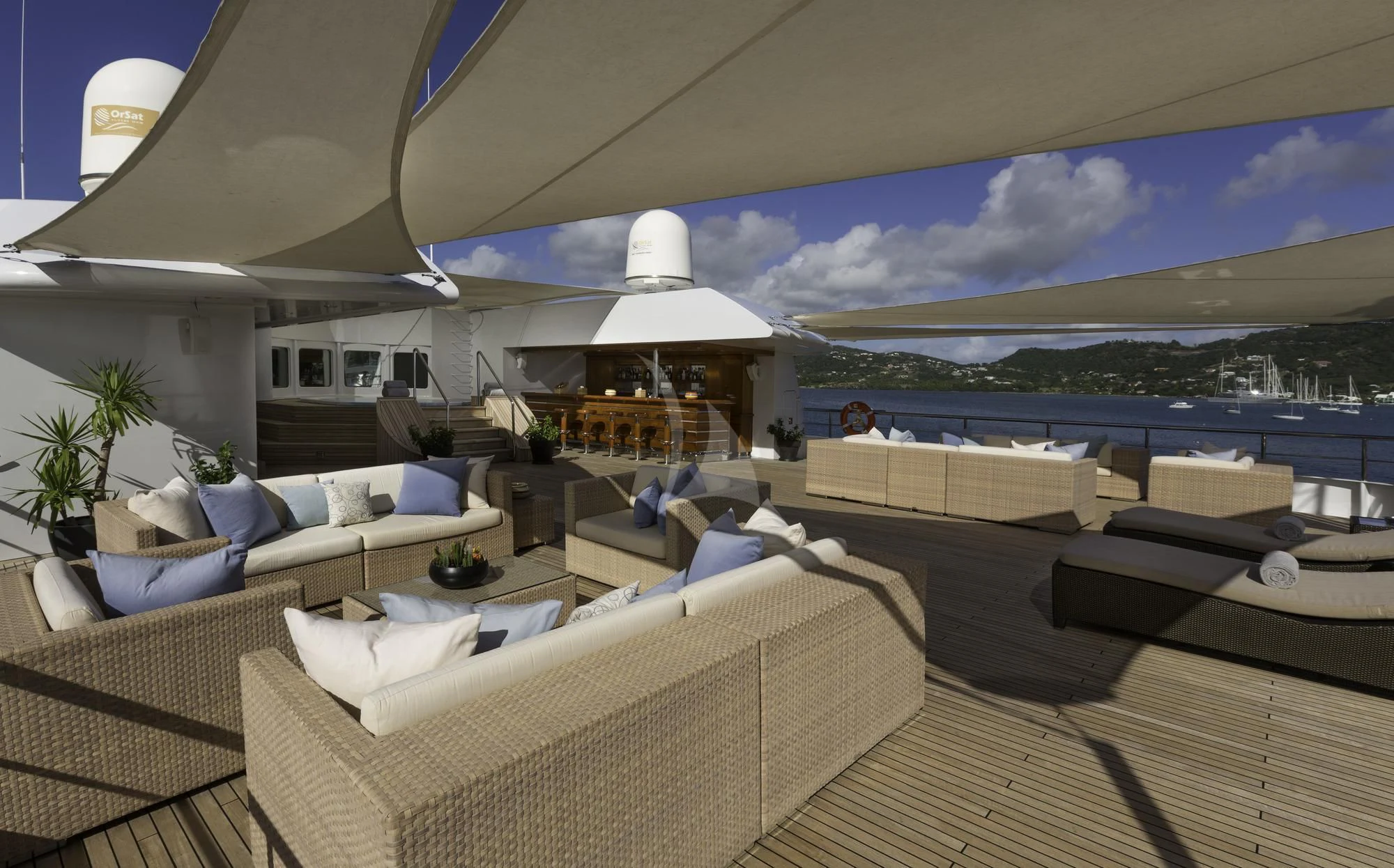 a room with a large white lounge and a large white building with a large white window and a aboard LAUREN L Yacht for Sale