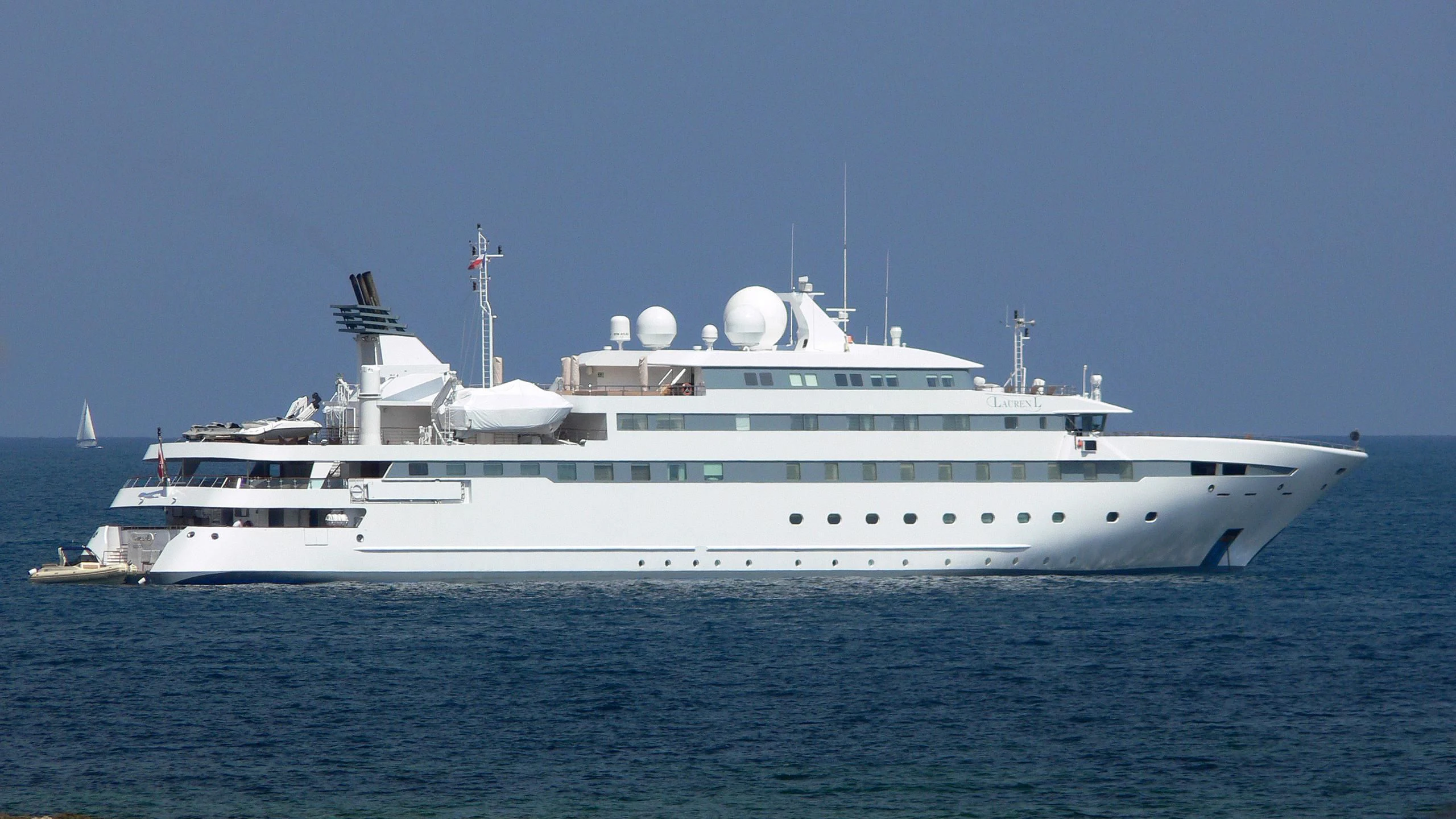 a large white boat in the water aboard LAUREN L Yacht for Sale