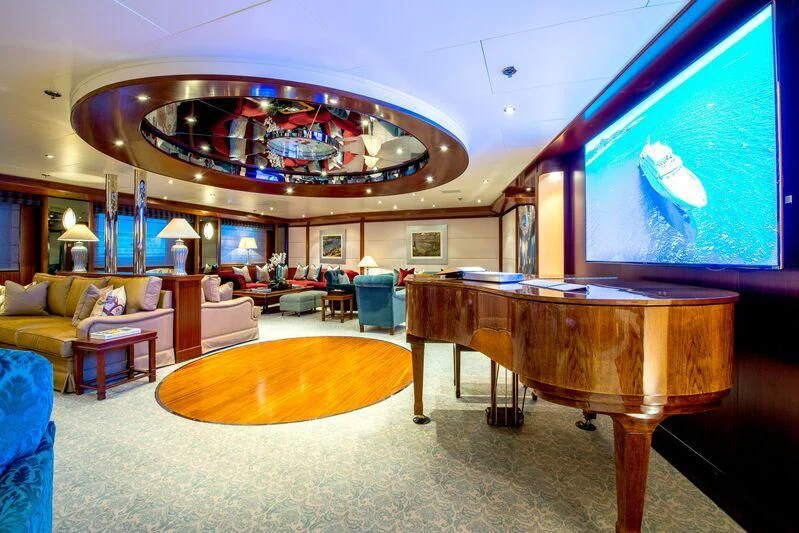 a large room with a large chandelier aboard LAUREN L Yacht for Sale