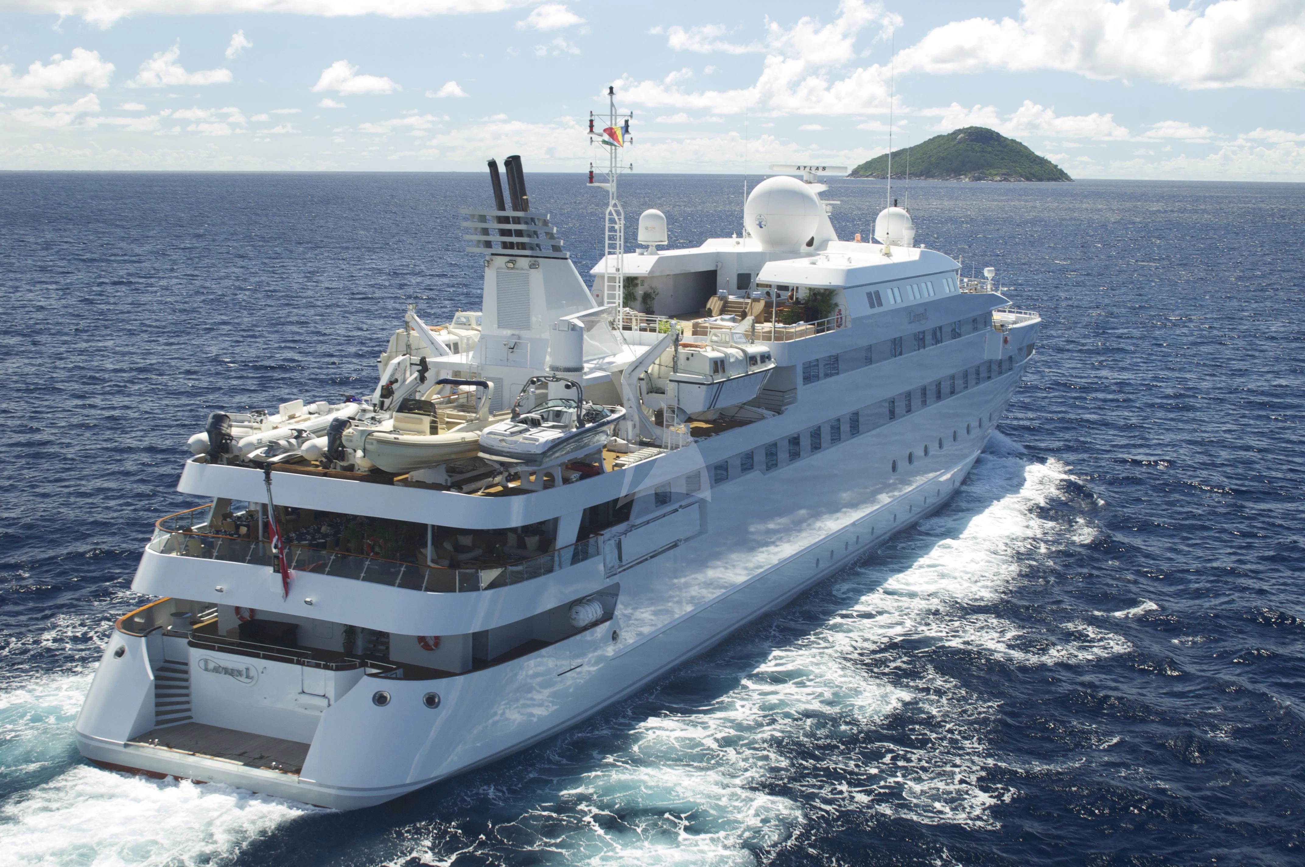 a large ship in the water aboard LAUREN L Yacht for Sale