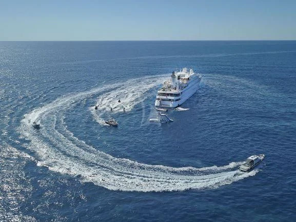 a group of boats in the ocean aboard LAUREN L Yacht for Sale