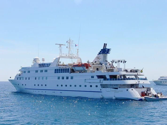 a large white boat in the water aboard LAUREN L Yacht for Sale