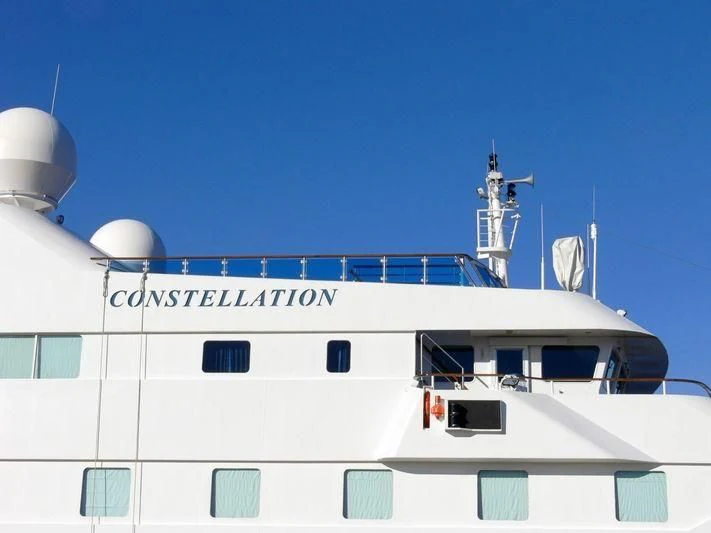 a white building with a satellite dish on top aboard LAUREN L Yacht for Sale