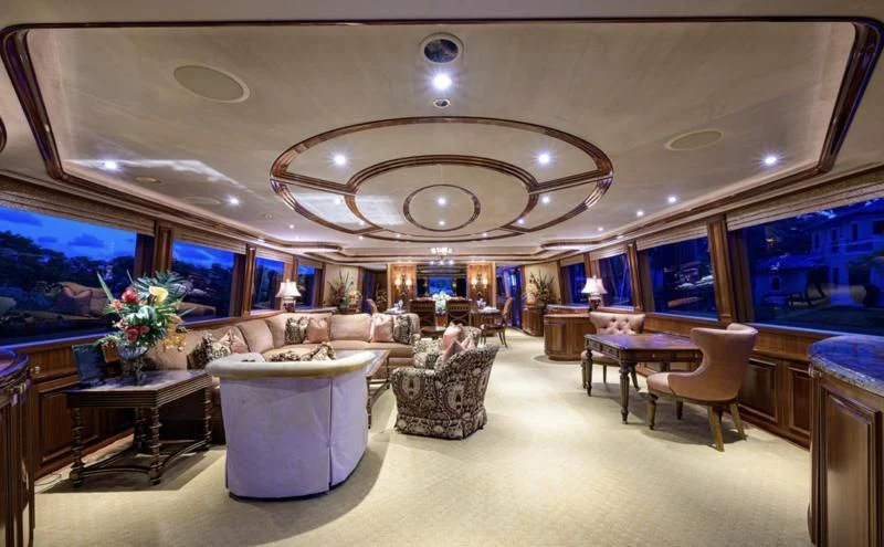 a large room with a large chandelier and a large mirror aboard SYMPHONY Yacht for Sale