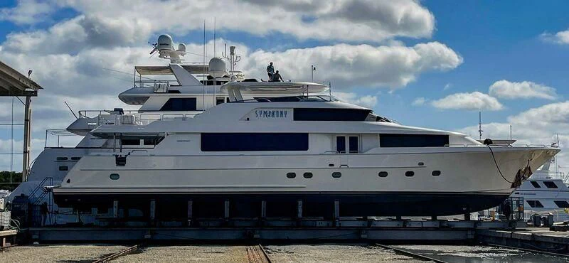a large white yacht aboard SYMPHONY Yacht for Sale