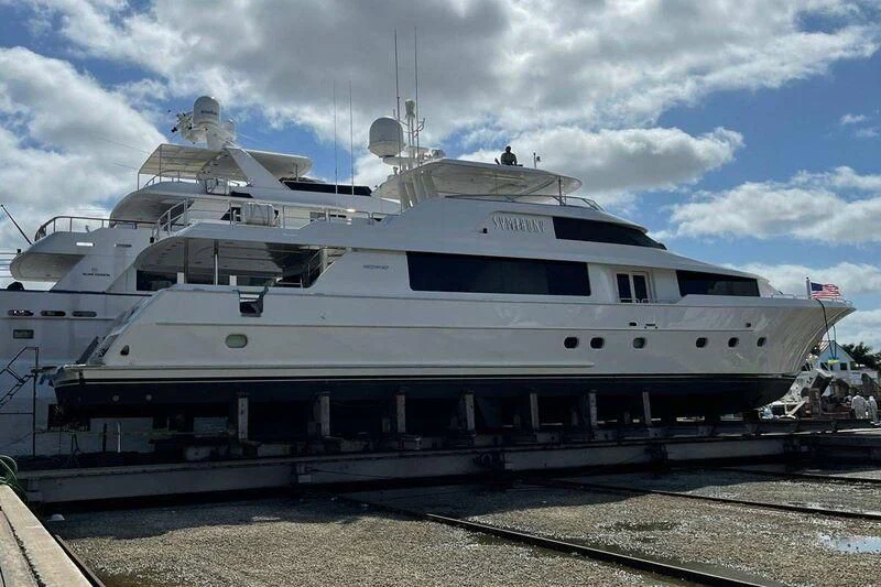 a large white yacht aboard SYMPHONY Yacht for Sale