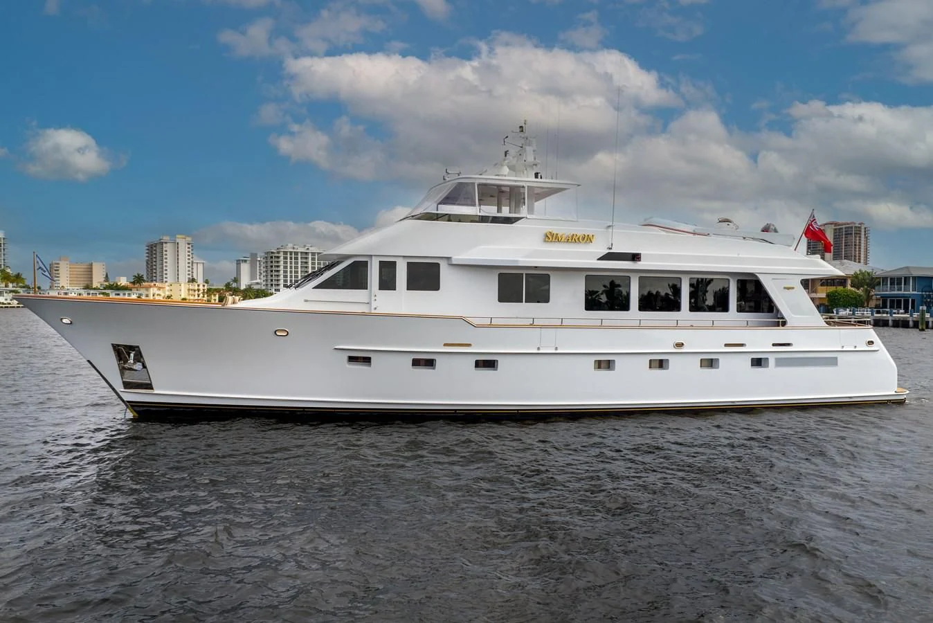 a white yacht in the water aboard SIMARON Yacht for Sale