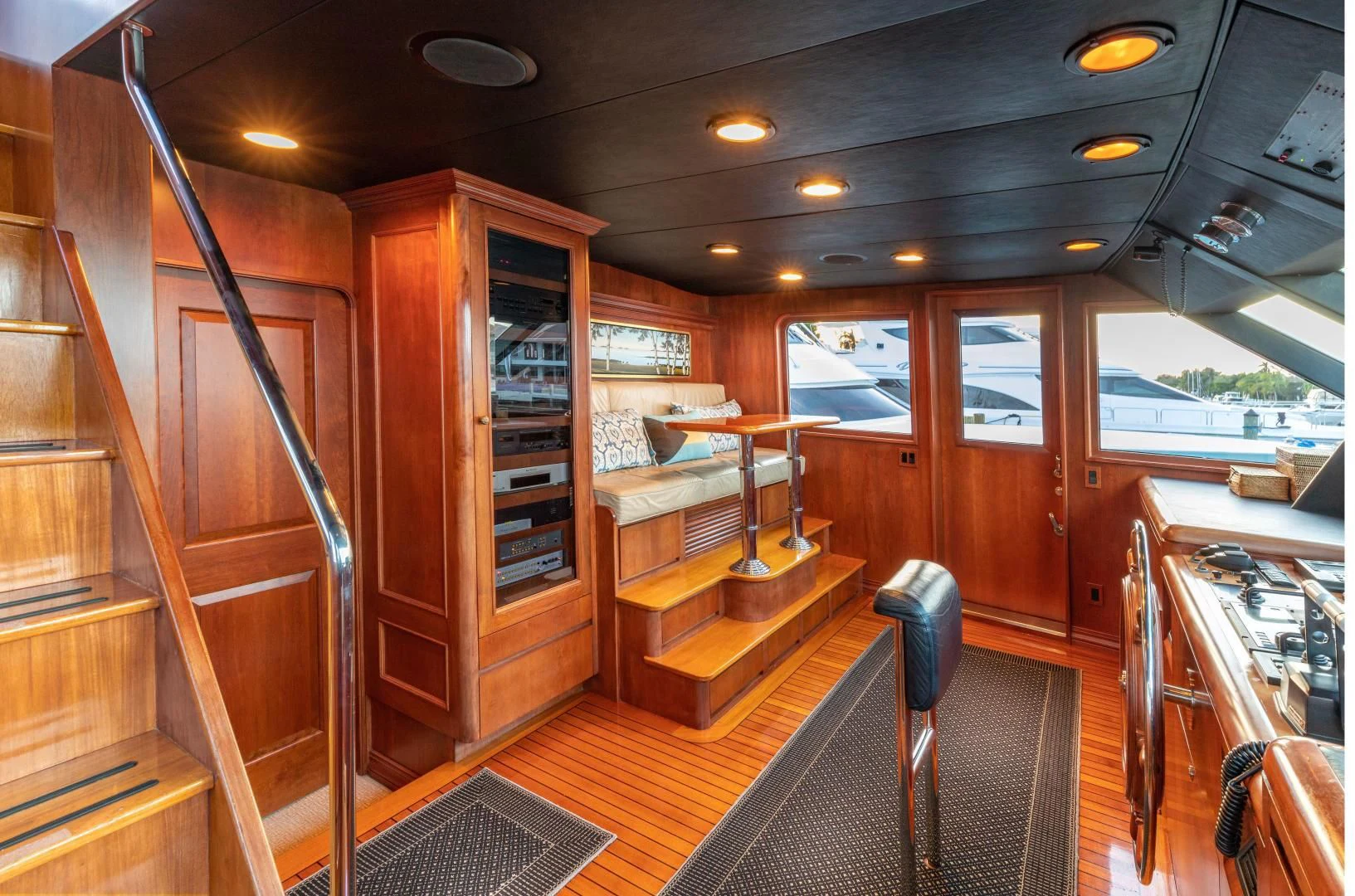 a room with wooden furniture aboard SIMARON Yacht for Sale