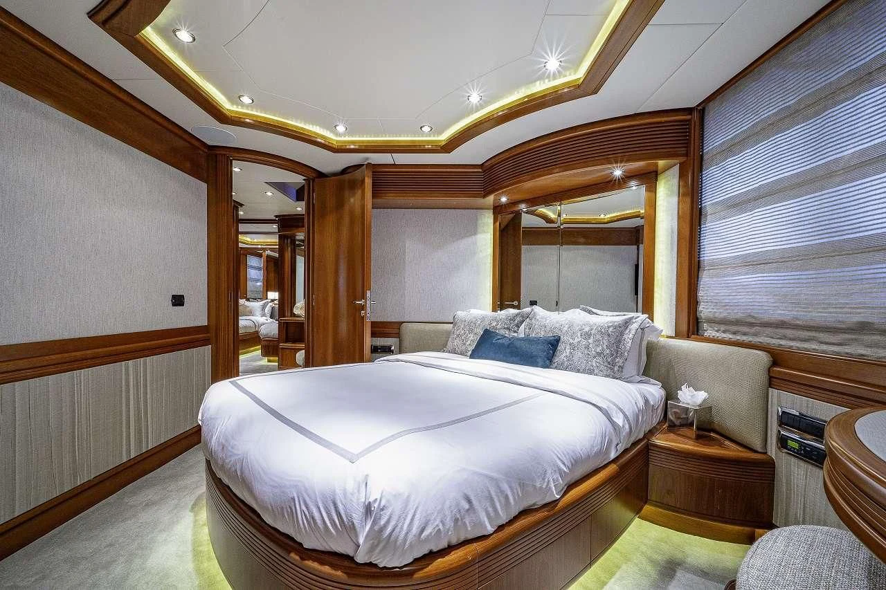 a large bed in a room aboard SWEET EMOCEAN Yacht for Sale