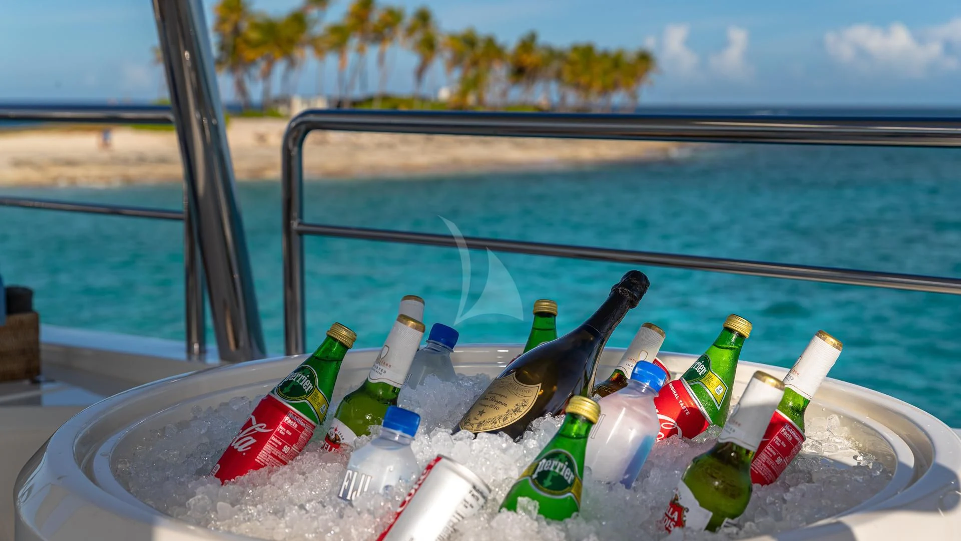 bottles of alcoholic drinks on a table aboard SWEET EMOCEAN Yacht for Sale