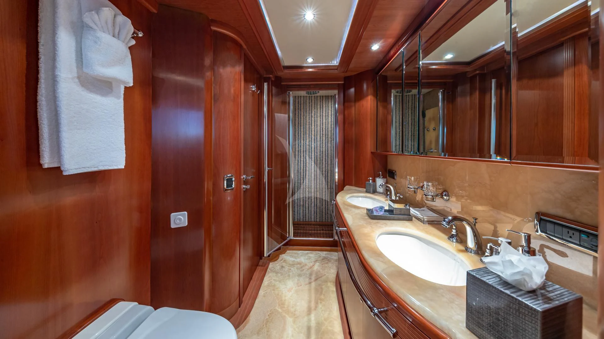a bathroom with a countertop sink and a mirror aboard SWEET EMOCEAN Yacht for Sale