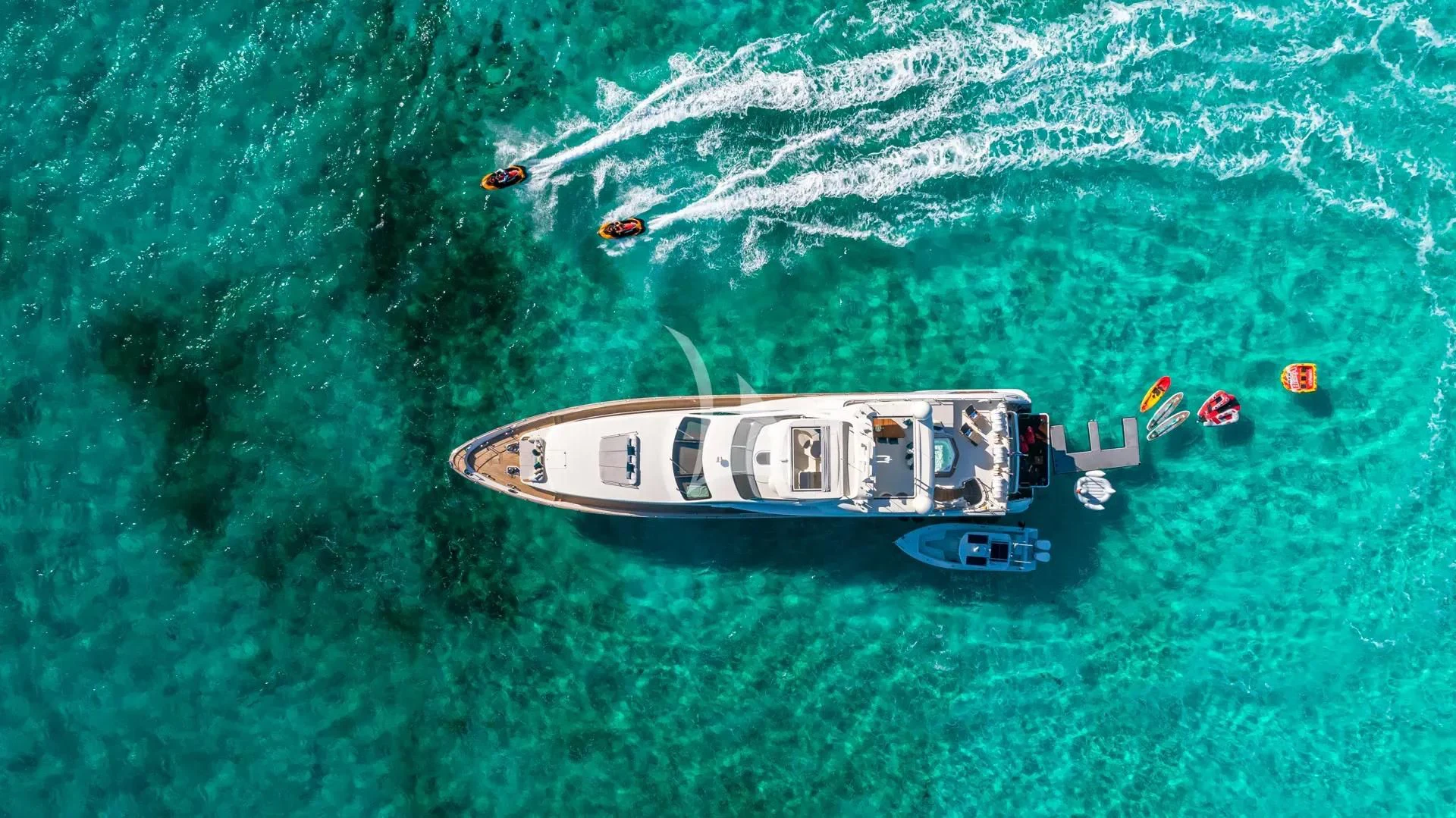 a helicopter flying over a field aboard SWEET EMOCEAN Yacht for Sale
