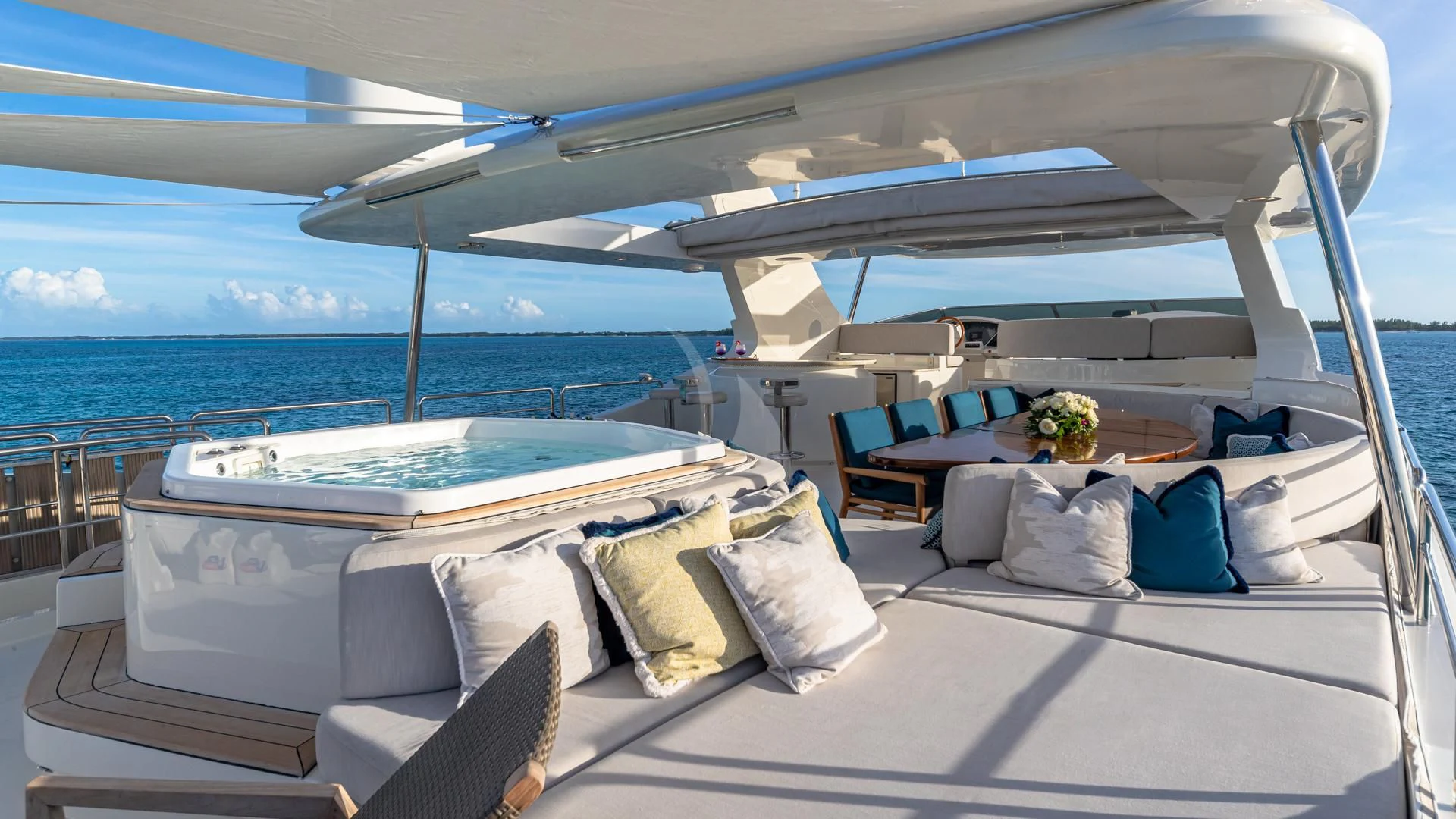 a large white bed with a large white pillow on it aboard SWEET EMOCEAN Yacht for Sale