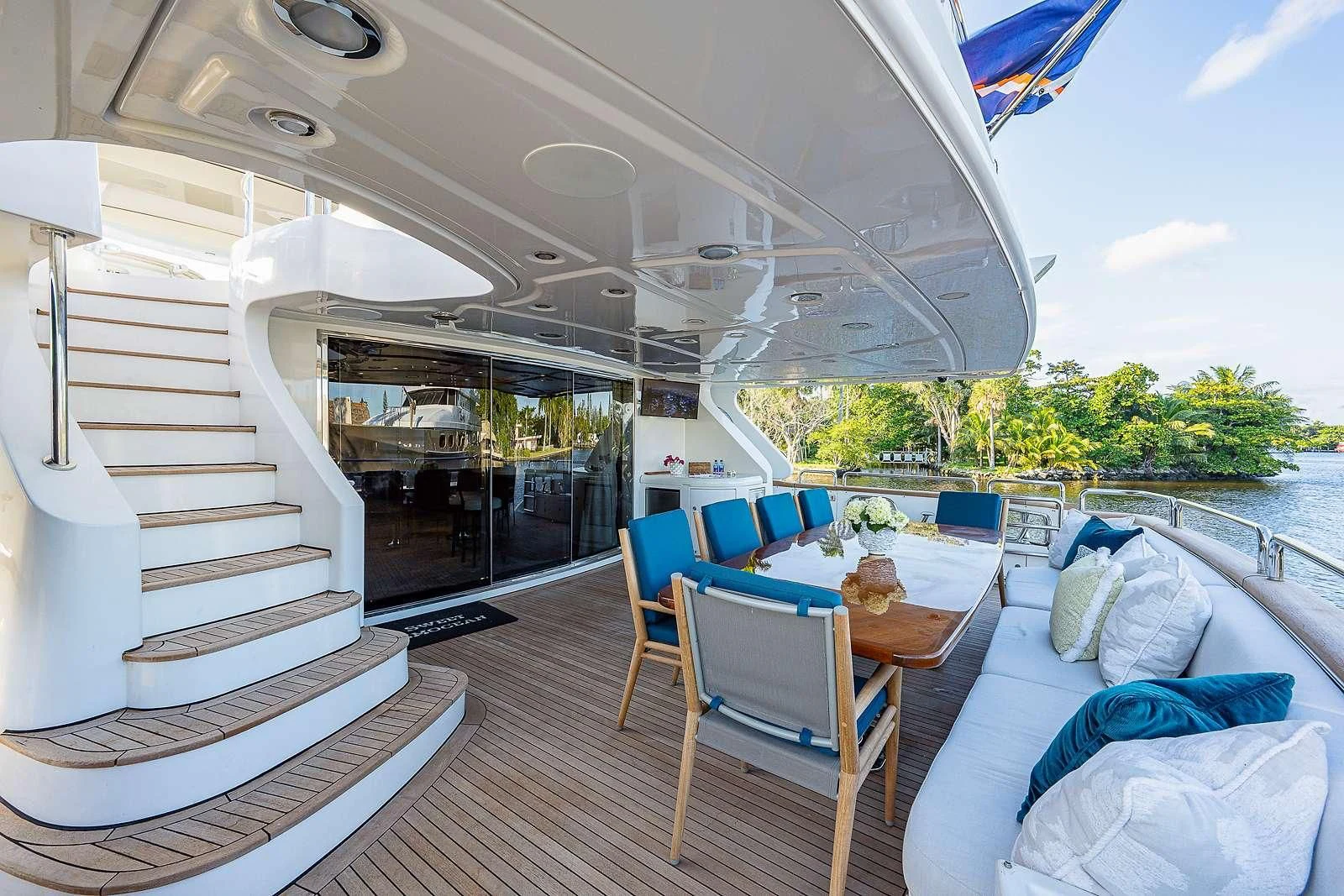 a boat with a table and chairs aboard SWEET EMOCEAN Yacht for Sale
