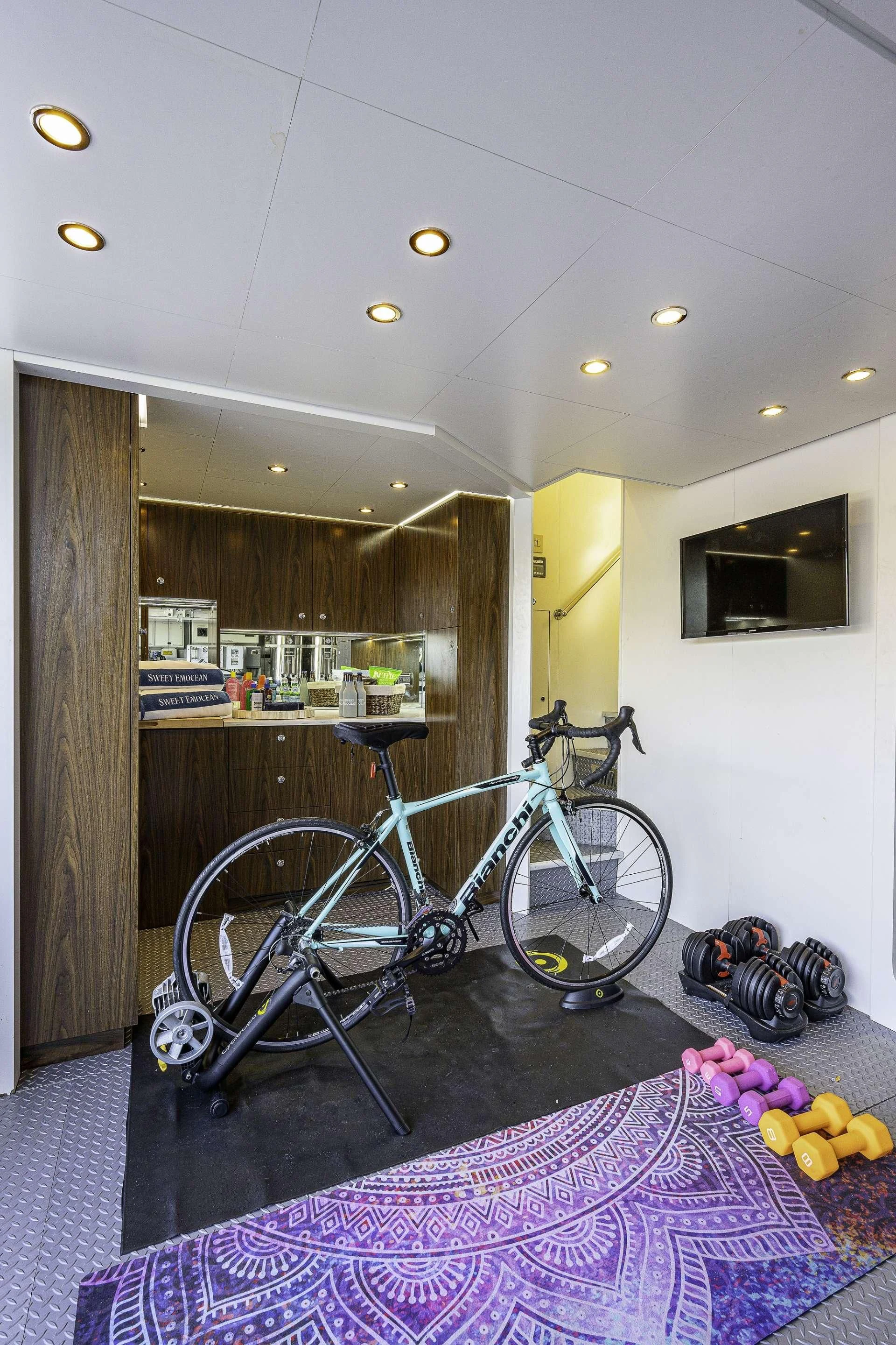 a bicycle parked in a room aboard SWEET EMOCEAN Yacht for Sale